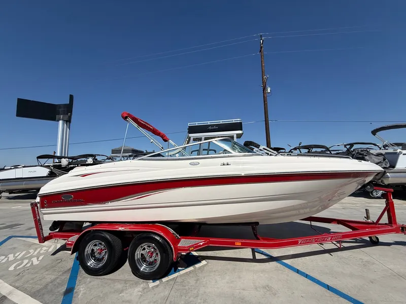Slide: The Image of 2006 Chaparral SSi 210 boat on red trailer. - 4