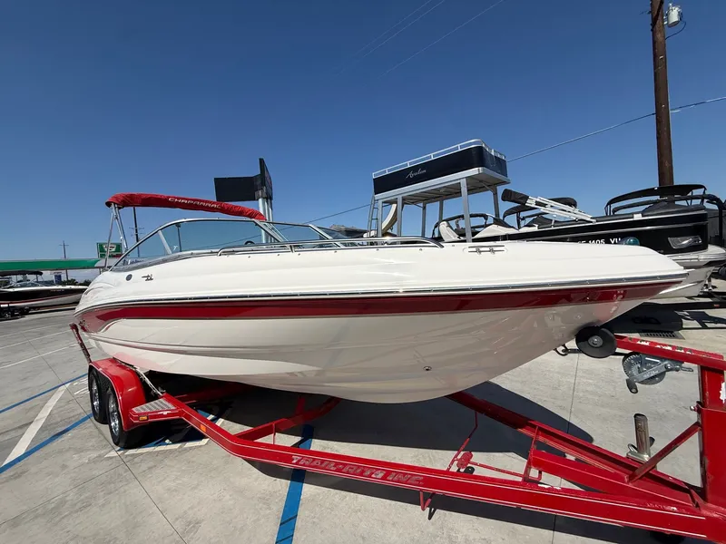 Slide: The Image of 2006 Chaparral SSi 210 boat on red trailer outdoors. - 5