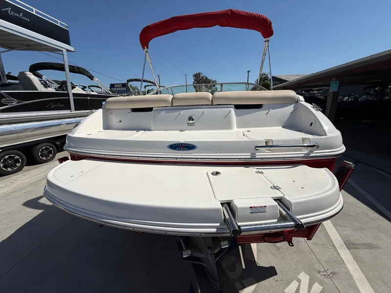 Slide: The Image of 2006 Chaparral SSi 210 boat with red sunshade. - 7