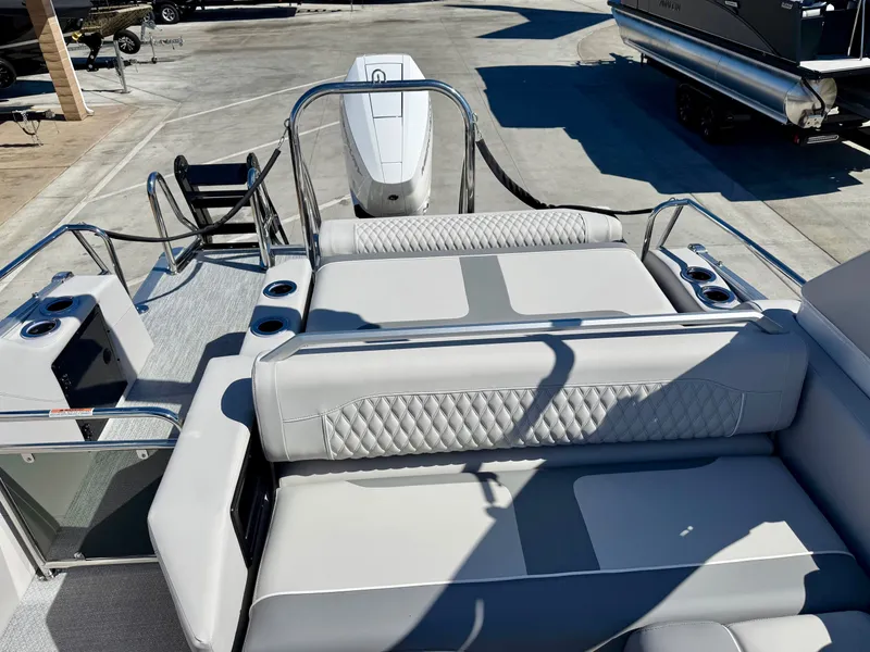Slide: The Image of Luxurious Avalon Excalibur boat with comfortable seating and powerful Mercury V10 engine. - 6
