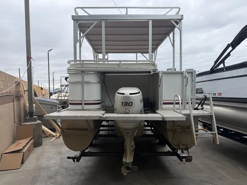 Slide: The Image of Rear view of a 2003 Sea Ray Sundancer 280 boat in dock. - 3