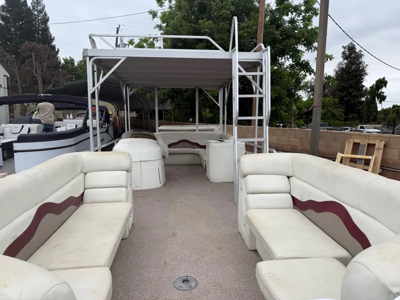 Slide: The Image of Interior of a 2003 Sea Ray Sundancer 280 with white seating. - 5