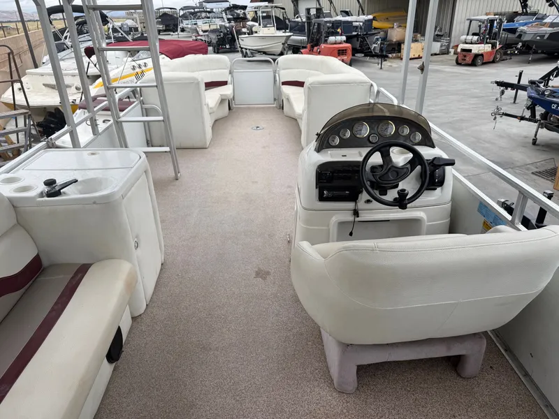 Slide: The Image of Interior of a 2003 Sea Ray Sundancer 280 with helm station. - 6