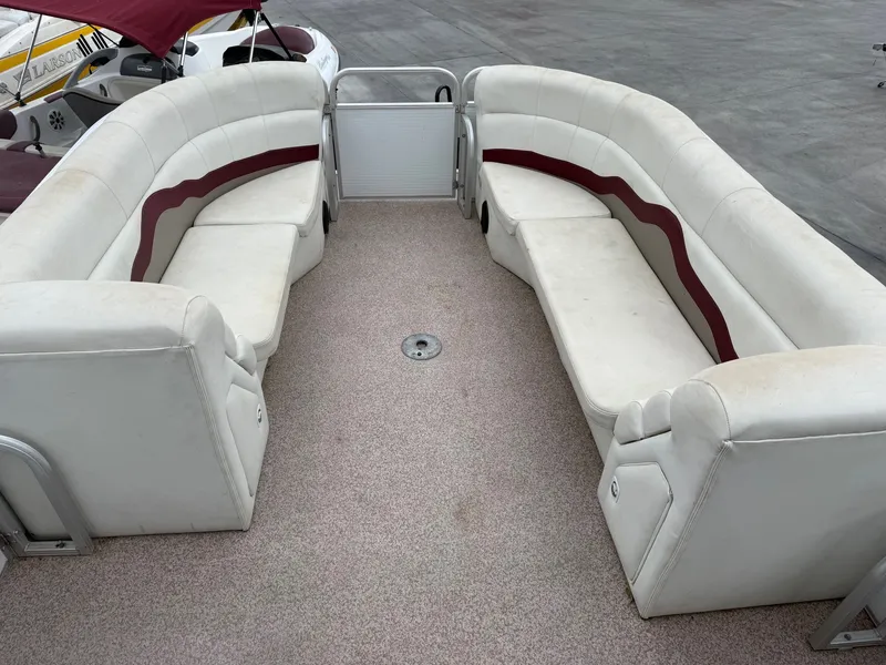 Slide: The Image of Interior of a 2003 Sea Ray Sundancer 280 with white seating. - 7