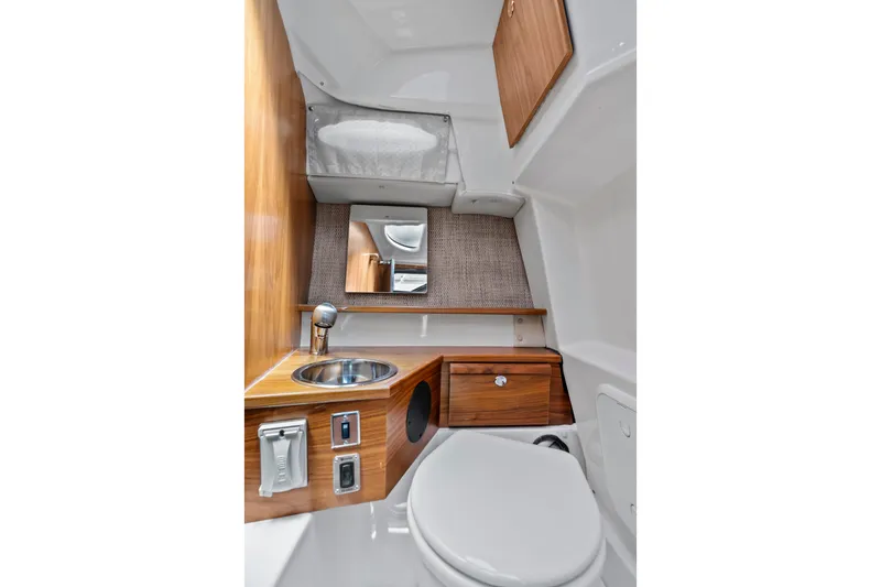 Slide: The Image of Compact bathroom in 2026 Solara S-250 Coupe with wood accents and modern fixtures. - 18