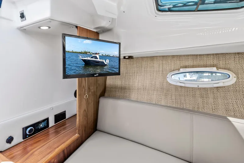 Slide: The Image of Interior of 2026 Solara S-250 Coupe with TV, window, and seating area. - 20