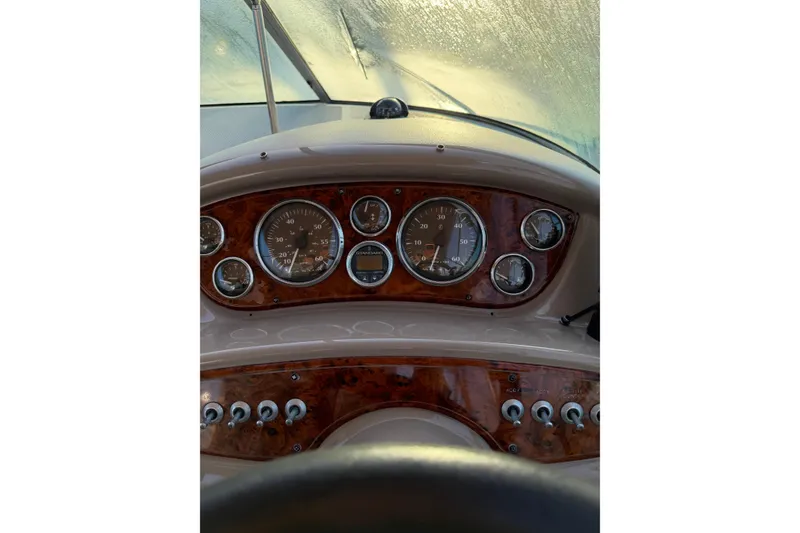 Slide: The Image of Dashboard of a 2001 Maxum 2800 SCR boat with gauges and controls. - 3