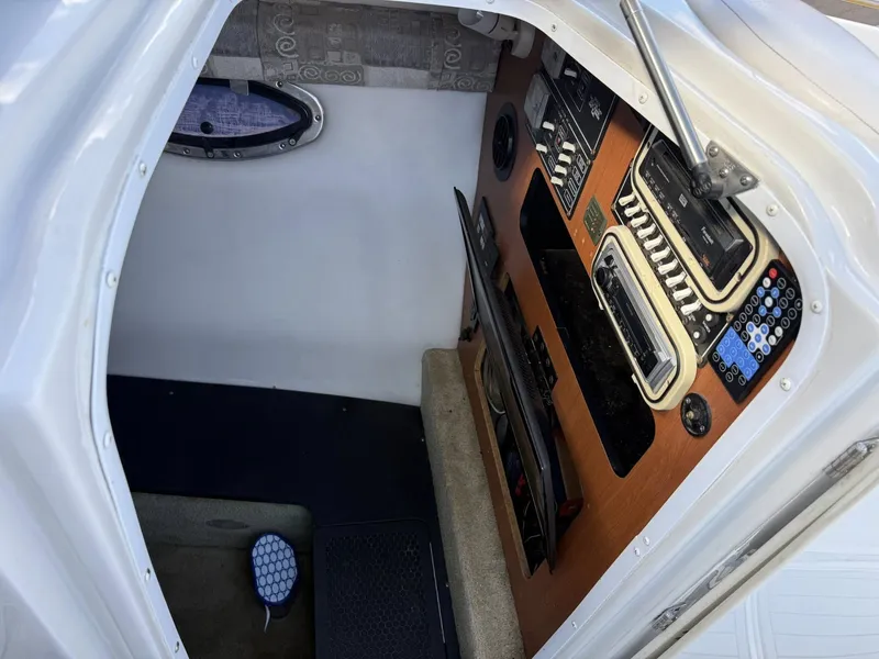 Slide: The Image of Interior of 2007 Crownline Bowrider 320 LS with control console. - 12