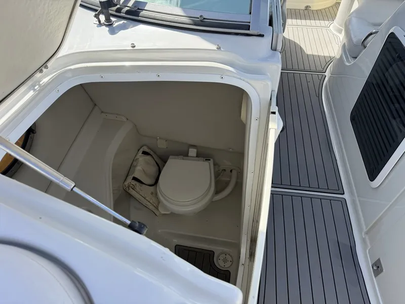 Slide: The Image of 2007 Crownline Bowrider 320 LS boat toilet detail view. - 20