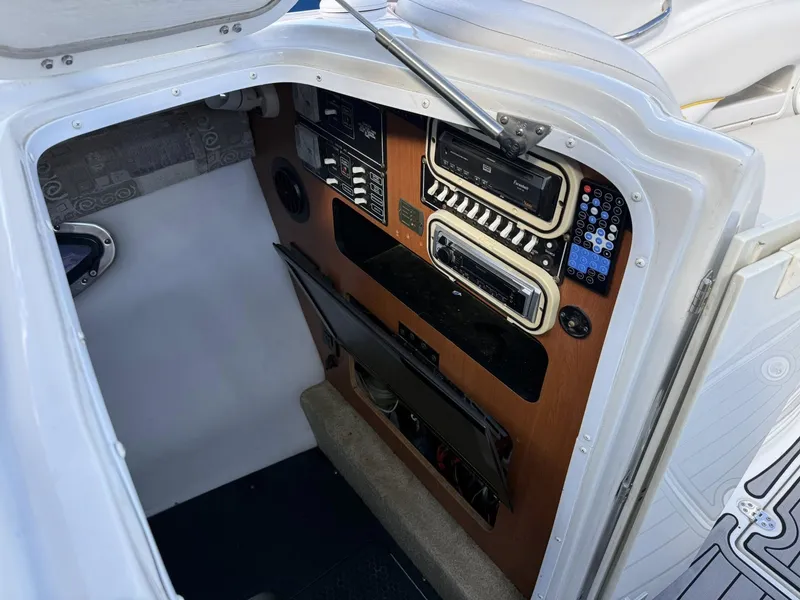 Slide: The Image of Interior of 2007 Crownline Bowrider 320 LS with controls and electronics. - 21