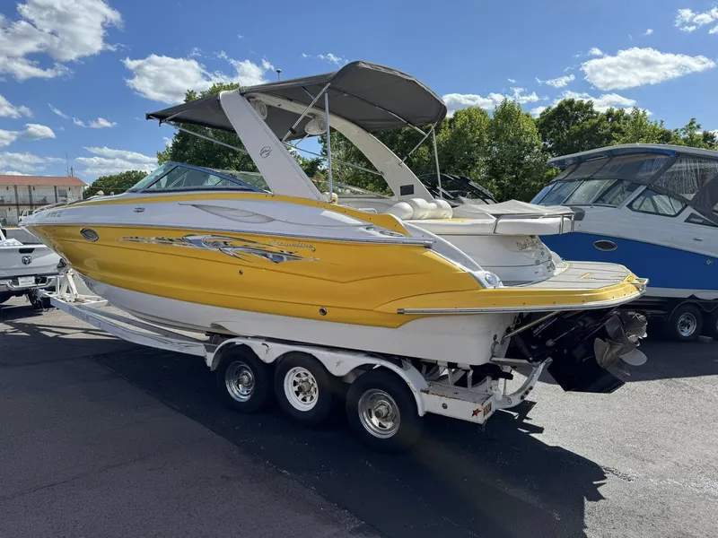Slide: The Image of 2007 Crownline Bowrider 320 LS boat on trailer, sunny day. - 25