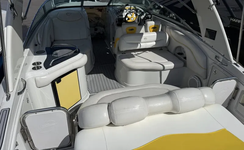 Slide: The Image of Interior of 2007 Crownline Bowrider 320 LS with white and yellow upholstery. - 26
