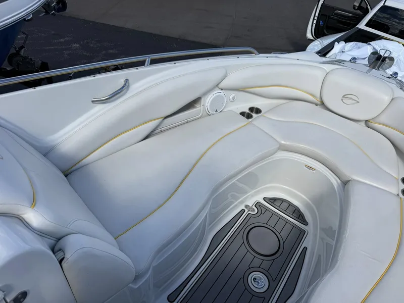 Slide: The Image of Interior of a 2007 Crownline Bowrider 320 LS with white upholstery. - 5