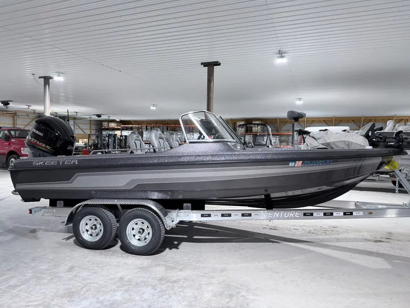 Slide: The Image of 2016 Skeeter MX 2040 boat on trailer in warehouse. - 11