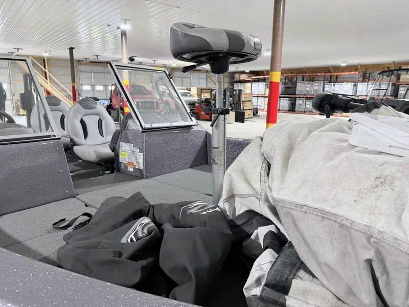 Slide: The Image of Interior of a 2016 Skeeter MX 2040 boat in a storage facility. - 4