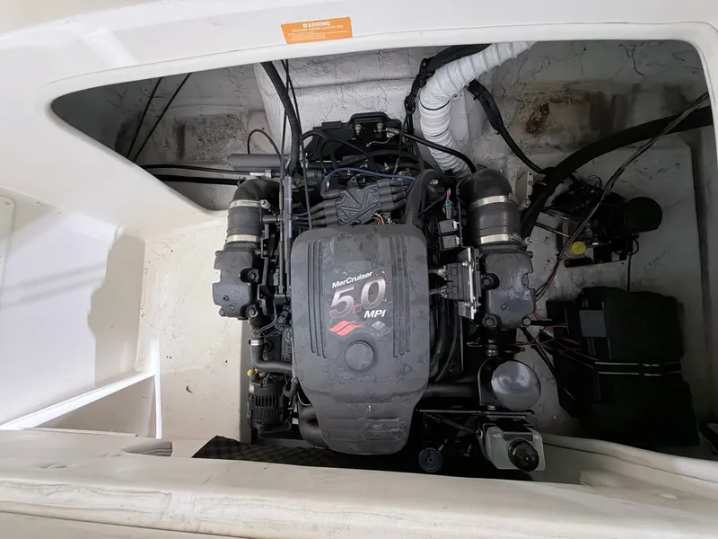 Slide: The Image of Engine compartment of 2003 Rinker 232 Captiva with MerCruiser 5.0 MPI engine. - 14