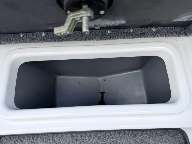 Slide: The Image of Interior of a 2008 Triton 18X2 boat with storage compartment. - 20