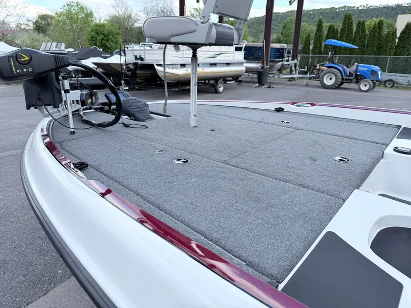 Slide: The Image of 2008 Triton 18X2 boat with gray deck and seat. - 25
