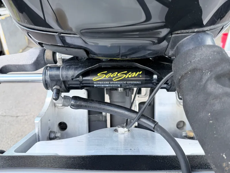 Slide: The Image of SeaStar outboard hydraulic steering on a 2008 Triton 18X2 boat. - 7