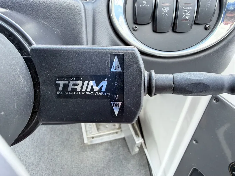 Slide: The Image of Pro Trim control in a 2008 Triton 18X2 boat. - 9