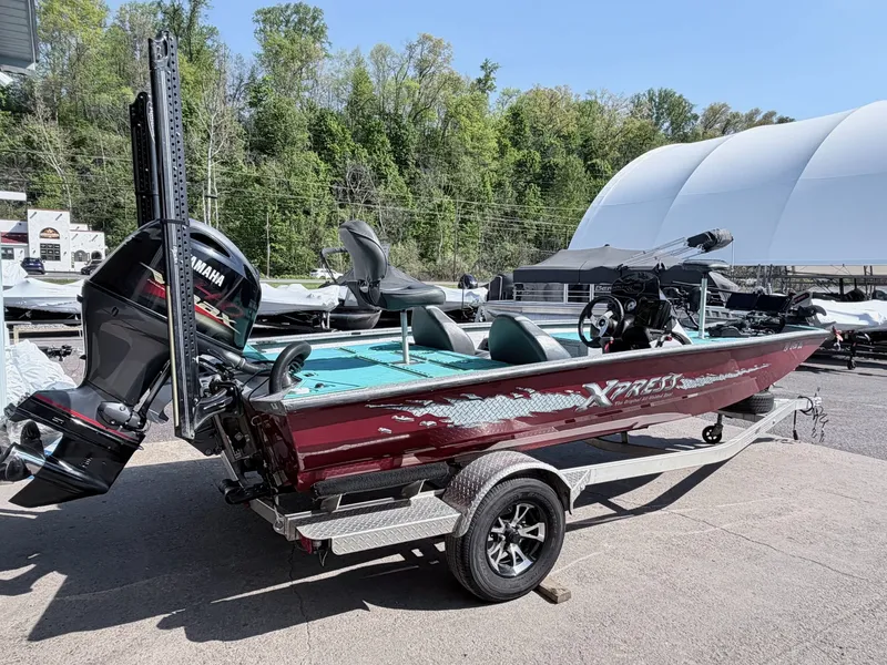 The Image of 2017 Xpress X19 boat with Yamaha motor on trailer. - 1
