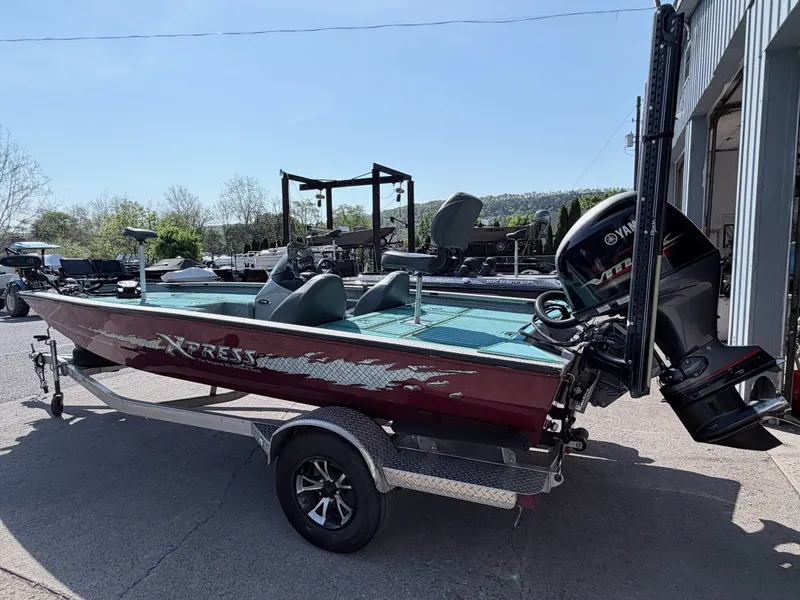 Slide: The Image of 2017 Xpress X19 boat with Yamaha motor on trailer. - 4