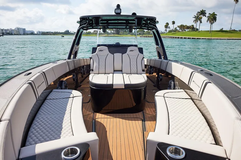 Slide: The Image of Luxurious interior of 2025 Midnight Express 37 Open boat with elegant seating and scenic water view. - 8