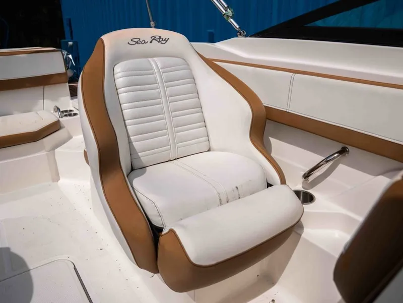Slide: The Image of 2018 Sea Ray SPX 210 Outboard boat seat in white and brown. - 15