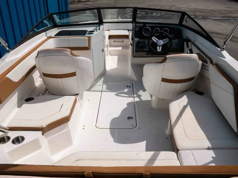 Slide: The Image of Interior of a 2018 Sea Ray SPX 210 Outboard boat, white seating. - 4