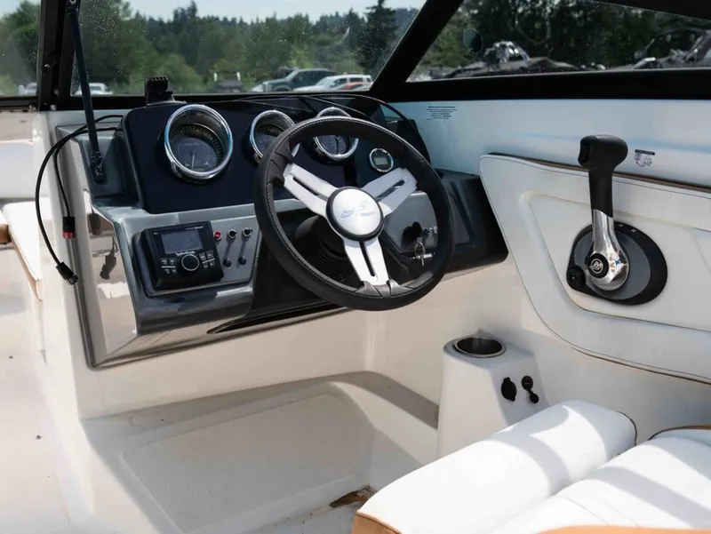 Slide: The Image of Interior view of 2018 Sea Ray SPX 210 Outboard helm. - 8