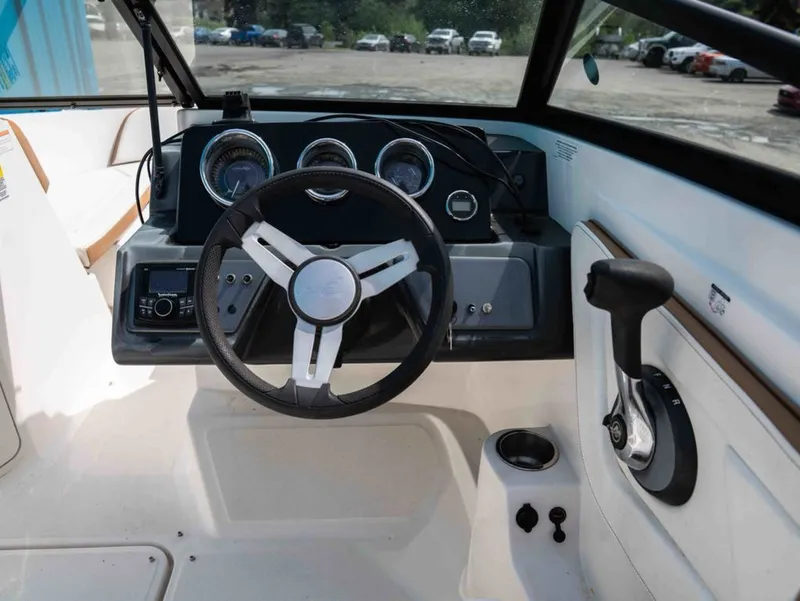 Slide: The Image of Interior view of 2018 Sea Ray SPX 210 Outboard cockpit. - 9