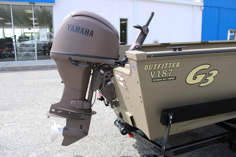 Slide: The Image of 2026 G3 Outfitter V187 T boat with Yamaha outboard motor. - 19