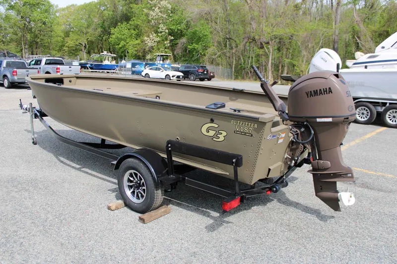 Slide: The Image of 2026 G3 Outfitter V187 T boat with Yamaha motor on trailer. - 6