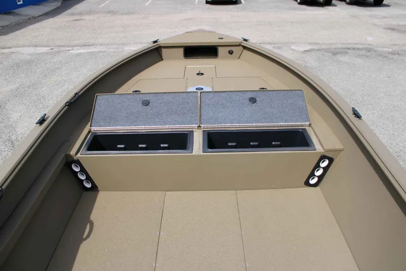 Slide: The Image of G3 Outfitter V187 T 2026 boat with storage compartments and rod holders. - 8