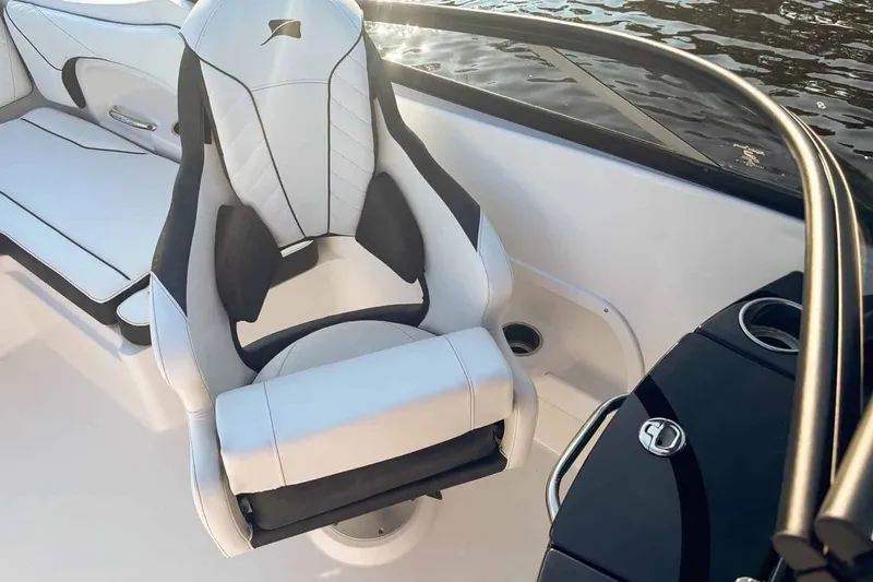 Slide: The Image of Interior of Stingray 23 OSX 2026 featuring luxurious seating design. - 7