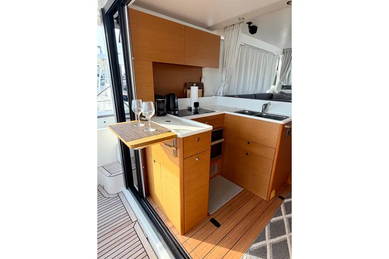 Slide: The Image of Modern kitchen interior of 2021 Beneteau Swift Trawler 41 Fly yacht. - 23