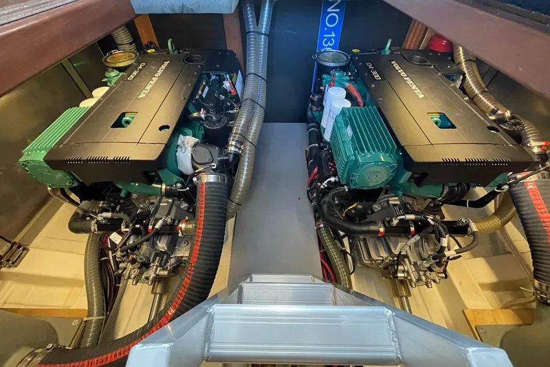 Slide: The Image of Engine room of 2021 Beneteau Swift Trawler 41 Fly with twin Volvo Penta engines. - 48