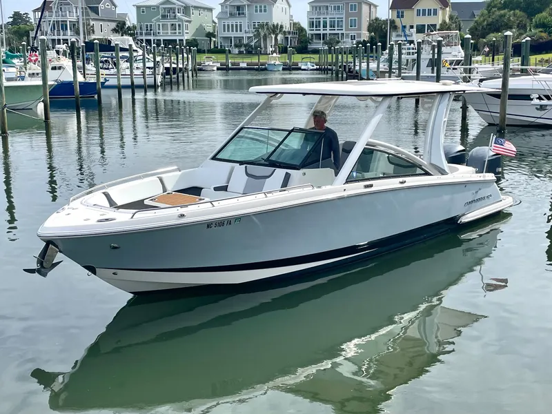 The Image of 2021 Chaparral 300 OSX boat in harbor, modern design. - 0