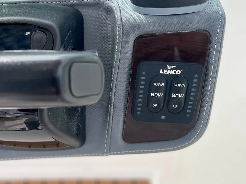 Slide: The Image of Lenco control panel on 2021 Chaparral 300 OSX boat. - 32