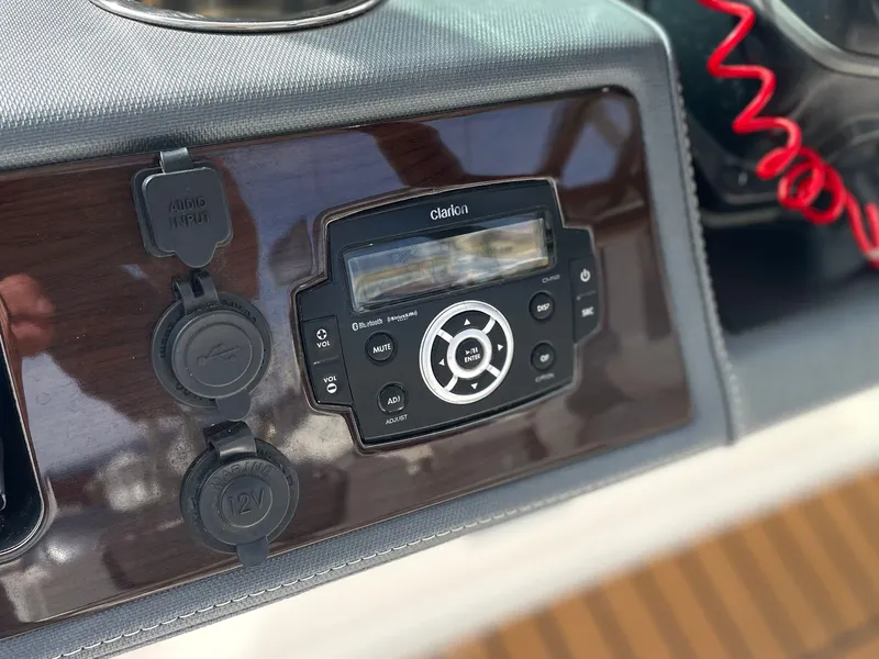 Slide: The Image of Audio control panel on a 2021 Chaparral 300 OSX boat. - 34