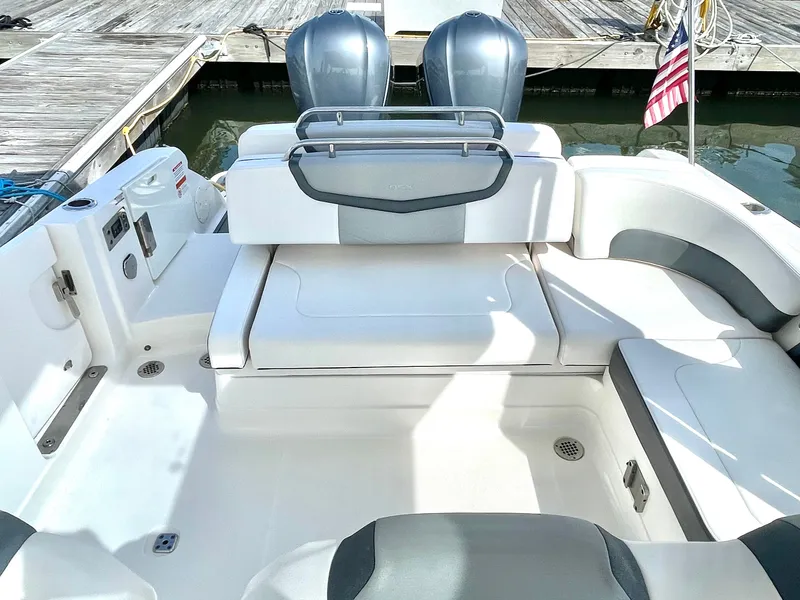 Slide: The Image of Interior of a 2021 Chaparral 300 OSX boat at the dock. - 38