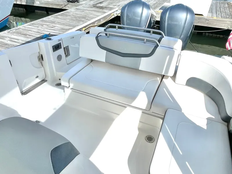 Slide: The Image of Interior of 2021 Chaparral 300 OSX with seating area. - 39