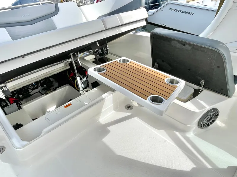 Slide: The Image of Interior of 2021 Chaparral 300 OSX with table and seating area. - 42