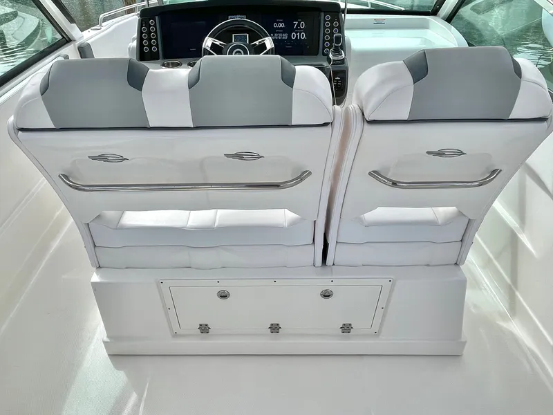 Slide: The Image of Interior of 2021 Chaparral 300 OSX with modern seats and helm console. - 48