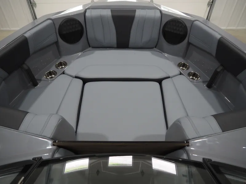 Slide: The Image of 2026 Malibu Wakesetter 21 LX interior with gray upholstery. - 10