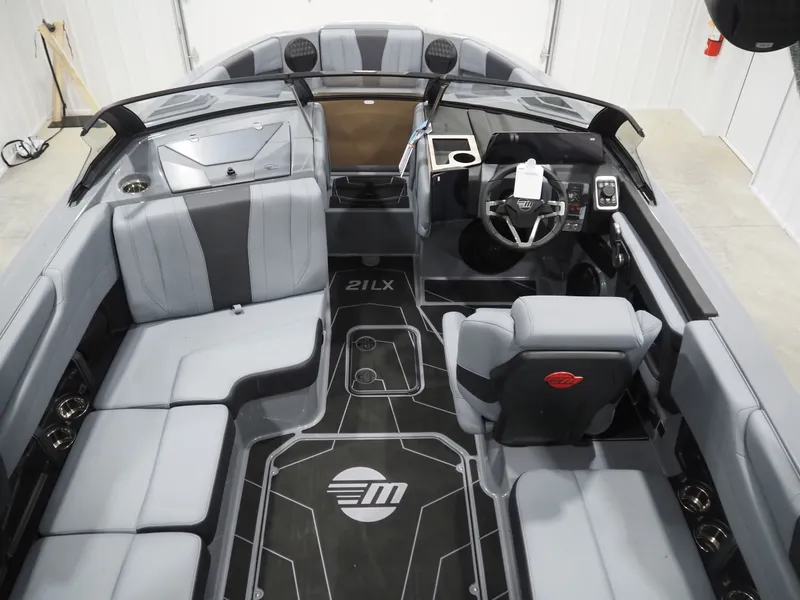 Slide: The Image of Interior of 2026 Malibu Wakesetter 21 LX with gray seating. - 7