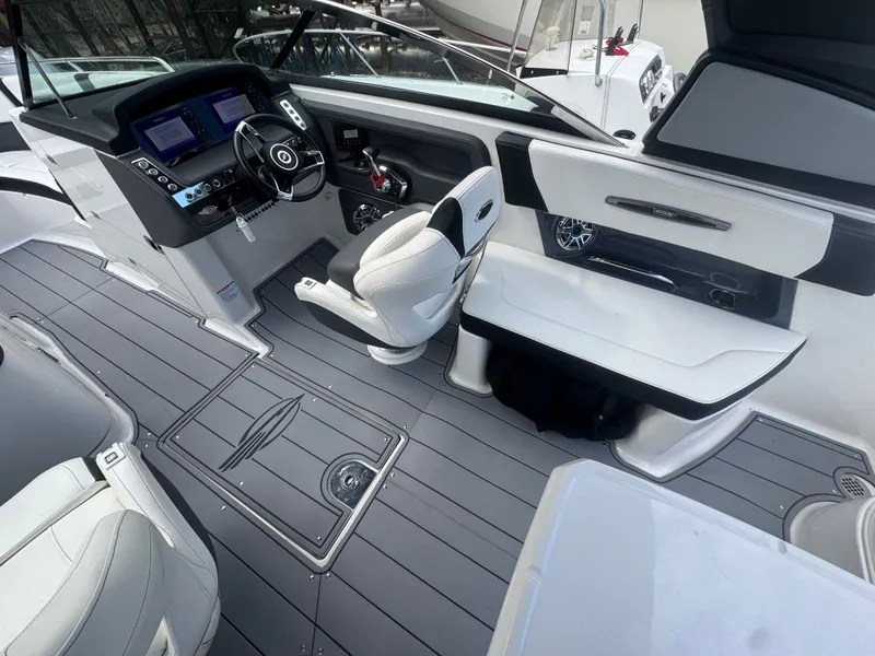 Slide: The Image of Interior of 2023 Chaparral 287 SSX with modern cockpit design. - 10