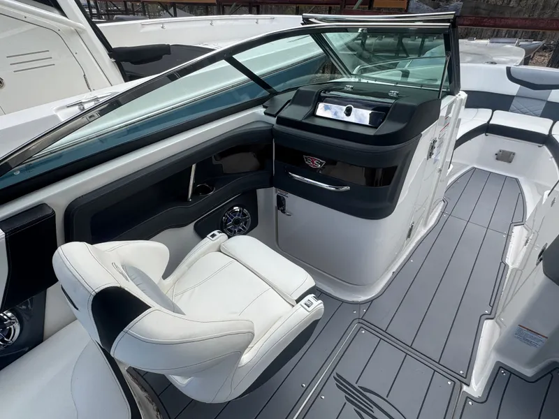 Slide: The Image of Interior of 2023 Chaparral 287 SSX with luxurious seating area. - 17