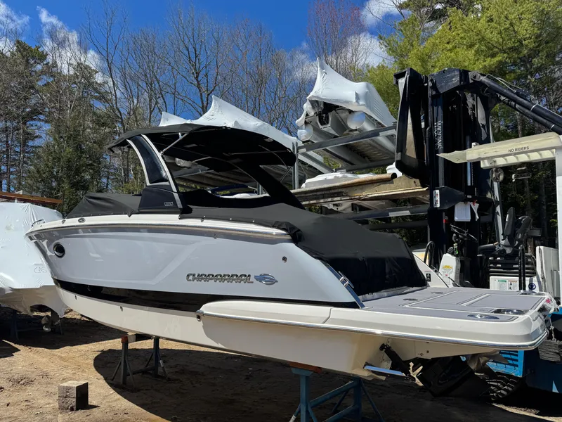 Slide: The Image of 2023 Chaparral 287 SSX boat on a trailer outdoors. - 3