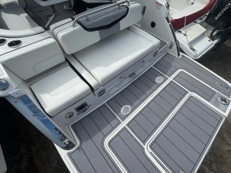 Slide: The Image of 2023 Chaparral 287 SSX rear deck with gray flooring. - 4
